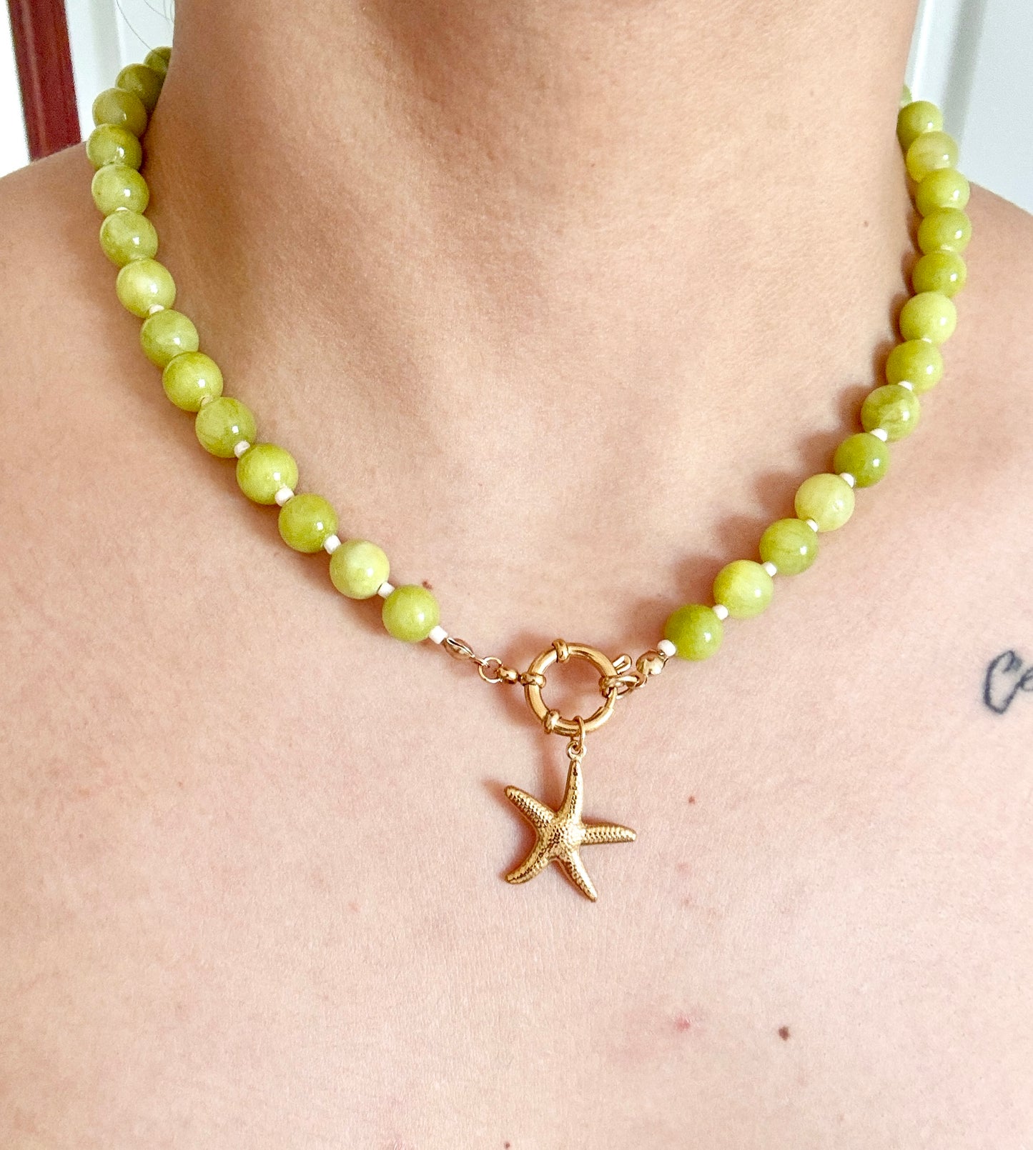 Starfish and pearl, green beaded necklace